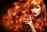 Long Curly Red Hair. Fashion Woman Portrait  Ludzie Plakat