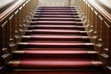 Empty wooden staircase with red carpet  Schody Fototapeta