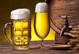 Beer glasses, old oak barrel and wheat ears.  Obrazy do Kuchni  Obraz