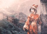 Woman in Chinese princess costume in the pine forest  Orientalne Fototapeta