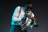 Retro african american jazz musician playing on his trumpet. Wea  Ludzie Plakat