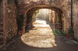 Unknown streets in the old medieval town in Italy  Fototapety Uliczki Fototapeta