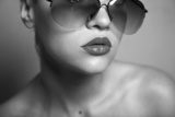 Fashion portrait of young pretty woman with glasses  Ludzie Plakat
