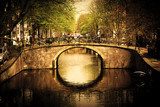 Amsterdam. Romantic bridge over canal.  Fototapety Sepia Fototapeta