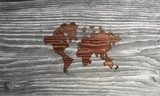 Classy international symbol in a stylish wooden background  Mapa Świata Fototapeta