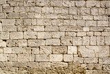 Ancient wall built of white stone  Mur Fototapeta