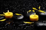 Spa concept-two candle with yellow flower petals on pebbles  Obrazy do Salonu SPA Obraz