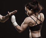 Beautiful fitness woman training boxing.  Fototapety do Klubu Fitness Fototapeta