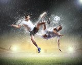 two football players striking the ball  Sport Fototapeta