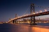 Dusk over San Francisco-Oakland Bay Bridge and San Francisco Skyline. Yerba Buena Island, San Francisco, California, USA. Mosty Obraz