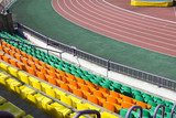 rows of plastic seats at stadium  Stadion Fototapeta