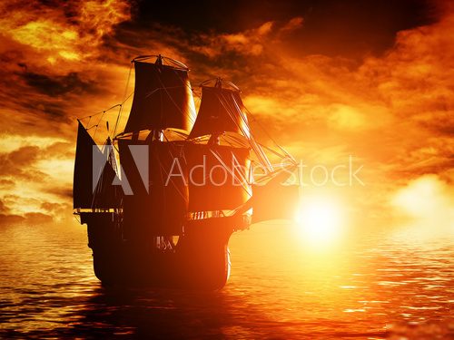 Ancient pirate ship sailing on the ocean at sunset  Pojazdy Fototapeta
