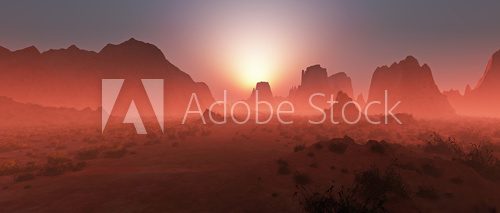 Red rocky desert landscape in the mist at sunset. Panoramic shot  Krajobraz Fototapeta