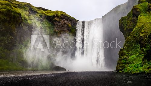 Landscape view of wild Skogafoss waterfall in Iceland  Fototapety Wodospad Fototapeta