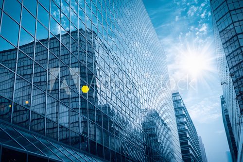 modern glass building under the blue sky  Architektura Plakat