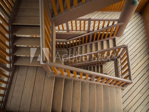 Wooden staircase in building  Schody Fototapeta