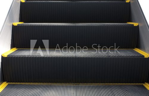 Escalator in close-up shot .Stairs are  rowed or lined things.  Schody Fototapeta