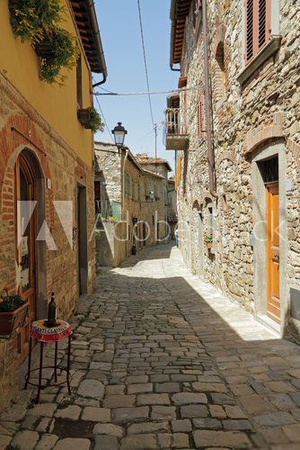 narrow stony street in tuscan borgo Montefioralle  Fototapety Uliczki Fototapeta