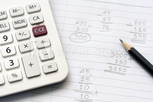 Calculator and pencil on note paper with calculation concept select focus Plakaty do Biura Plakat