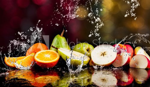 Pears, apples, orange  fruits and Splashing water Obrazy do Jadalni Obraz