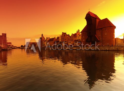 Sunset cityscape with vibrant colors. Gdansk, Poland.  Zachód Słońca Fototapeta
