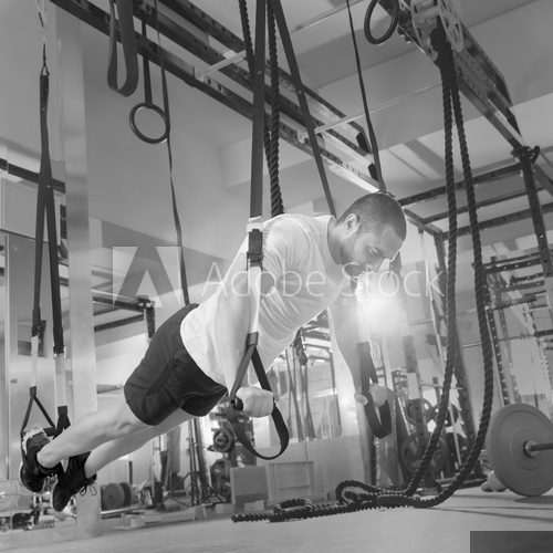 Crossfit fitness TRX push ups man workout  Fototapety do Siłowni Fototapeta