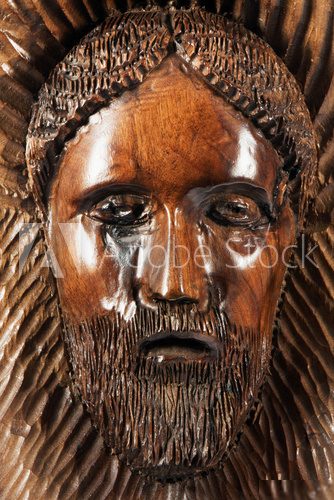 Carved face in the wood  Religijne Obraz