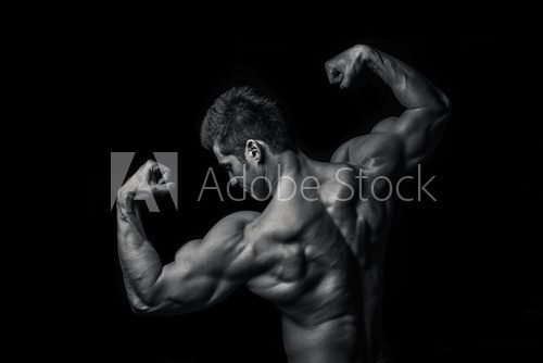 Man with muscular torso isolated on black background,  male tors  Fototapety do Siłowni Fototapeta