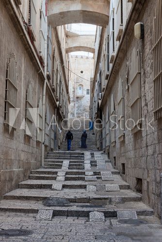 Narrow street in the Arab quarter of Jerusalem  Fototapety Uliczki Fototapeta
