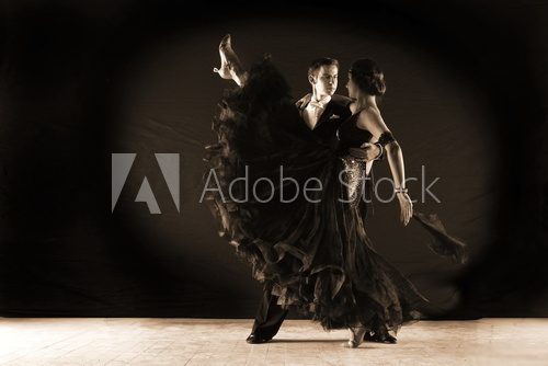 Latino dancers in ballroom against white background  Fototapety do Szkoły Tańca Fototapeta