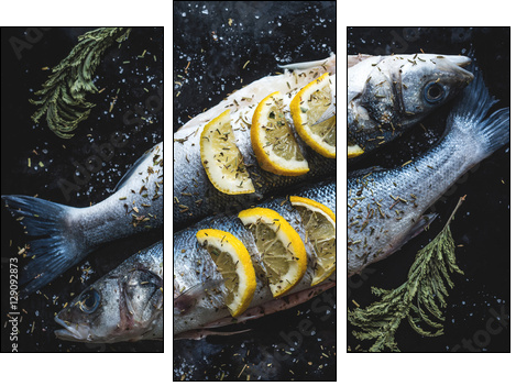 Sea bass fish with lemon on blackboard. Preparing for grill - Obraz trzyczęściowy, Tryptyk