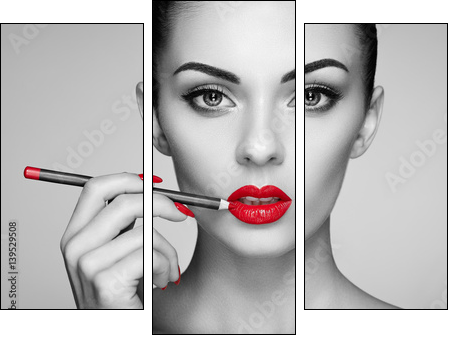 Black and white photo of woman painting lipstick. Beautiful woman face. Makeup detail. Beauty girl with perfect skin. Red lips and nails manicure - Obraz trzyczęściowy, Tryptyk