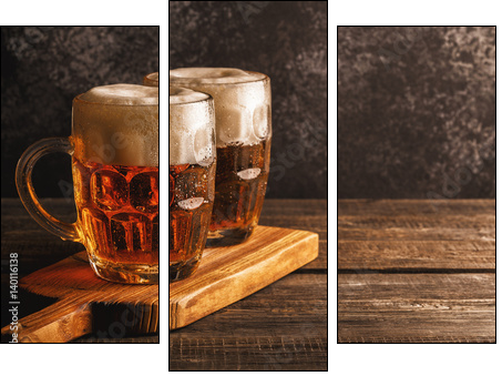 Cold beer in glass with chips on a dark background. - Obraz trzyczęściowy, Tryptyk
