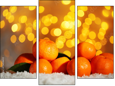 Fresh ripe mandarins on snow, on lights background  - Obraz trzyczęściowy, Tryptyk