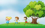 Three energetic kids playing at the hilltop with a big tree  Plakaty do Pokoju dziecka Plakat