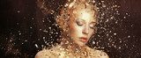 Art photo of golden woman splintering to thousands elements  Ludzie Plakat