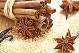 Cinnamon sticks, brown sugar and anise stars  Fototapety do Kawiarni Fototapeta
