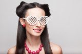Pin Up model in heart shaped sunglasses  Pin-up Obraz