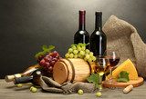 barrel, bottles and glasses of wine, cheese and ripe grapes  Plakaty do kuchni Plakat