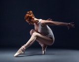 Graceful slender ballerina dancing in studio  Sport Plakat