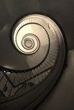 Kręta droga życia. Spiralne schody. Schody Fototapeta