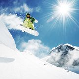 Snowboarder at jump inhigh mountains  Fototapety do Pokoju Nastolatka Fototapeta