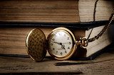 vintage pocket clock and old books  Fototapety Sepia Fototapeta