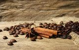 Roasted coffee beans  and spices on grunge wooden board  backgro  Plakaty do kuchni Plakat
