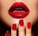 Red Sexy Lips and Nails closeup. Manicure and Makeup  Plakaty do Sypialni Plakat