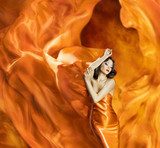 Woman dancing silk dress fire flame artistic orange portrait  Ludzie Obraz