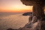 Inside view of sea cave at sunset. Nature composition  Krajobraz Fototapeta