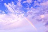 rainbow and blue sky, natural phenomenon  Niebo Fototapeta