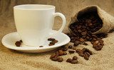 coffee mug and coffee beans  Kawa Fototapeta