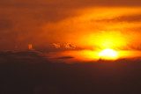 Sun Setting in a Smoky Western Sky  Zachód Słońca Fototapeta